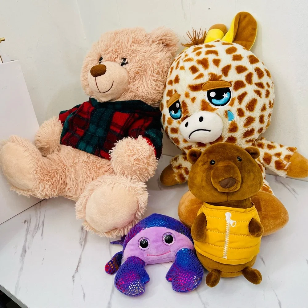 A lot of four Plush Giraffe, Tadebeare, Pig, and Fish Toy Set